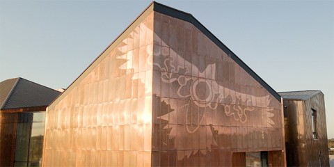 A perforated copper screen shows an image of Bunjil as a wedge-tailed eagle